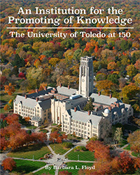 Cover of book with aerial photo of University Hall during the fall