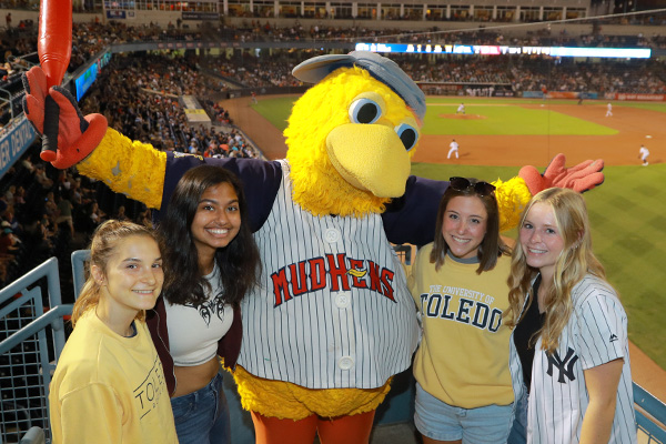 UToledo students with Muddy at a Toledo Mud Hens game