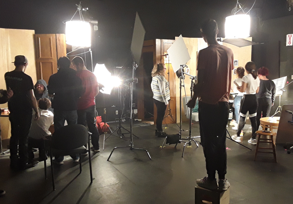 Two teams of UToledo Film students conducting a studio shoot