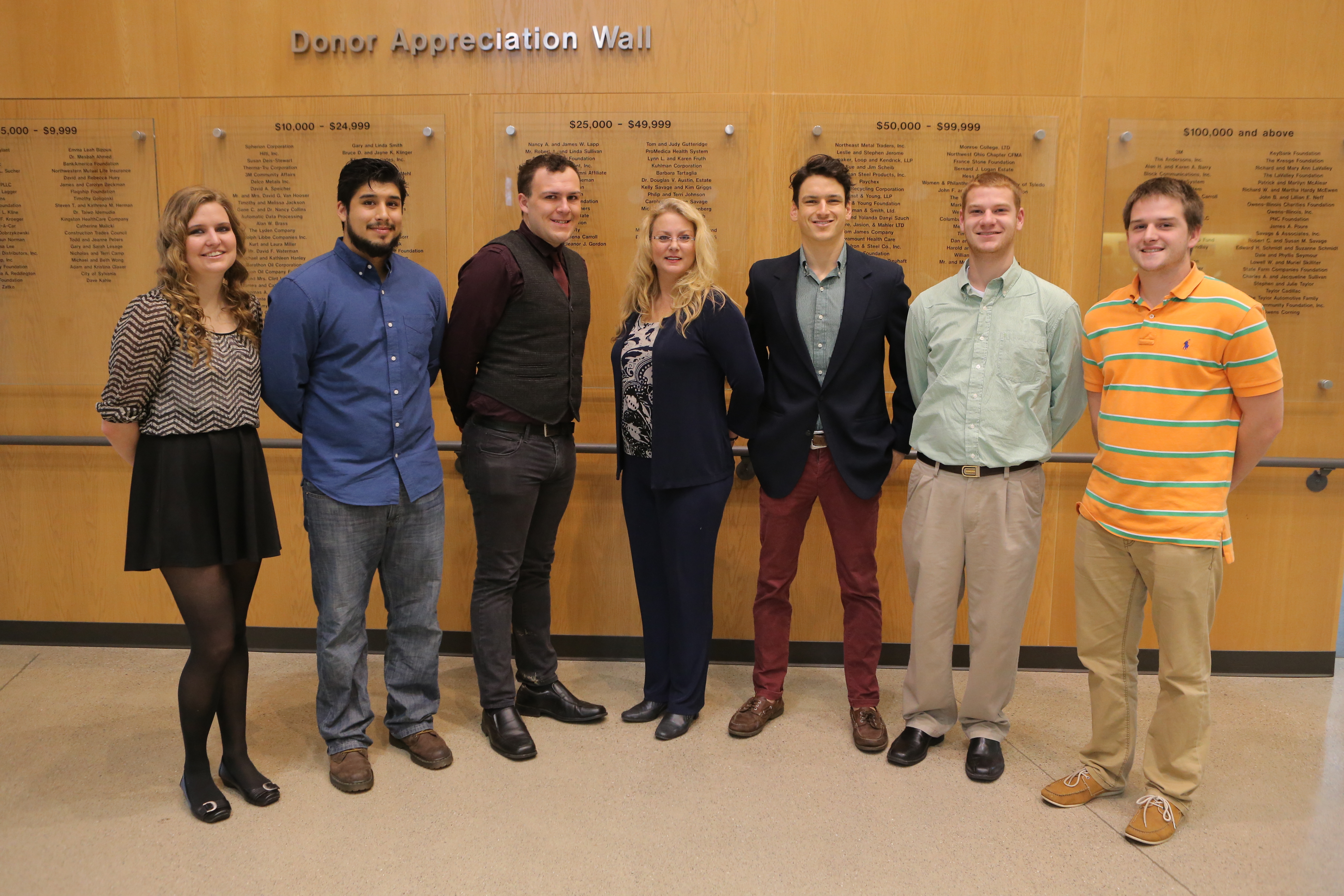 Professor Laura Williams, center, and some students already involved with the Free Tax Preparation Program, left to right, Marissa Gibbons, Max Sanchez, Austin Morrin, Evan Madden, Parker Wall and Derek Martindale.