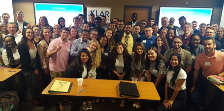 Members of the Klar Leadership Academy meet for a guest speaking engagement featuring Dr. Romules Durant.