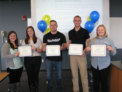 The winners of the 2016 business competition, left to right, Andrea Liedel and Hannah Ogden, Morpho Bag; Kevin Gibson, IceTyme; Joseph Strobbe, Quick Deploy, Casualty Carry Harness; and Mackenzie Miller, Freedom Model Trumpet.