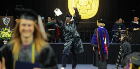 We’re proud to celebrate the 293 graduating students from the John B. and Lillian E. Neff College of Business and Innovation at The University of Toledo’s Fall 2023 Commencement. Pictured is a student celebrating his graduation.