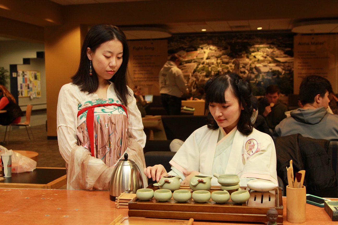 Chinese Scholars serving tea