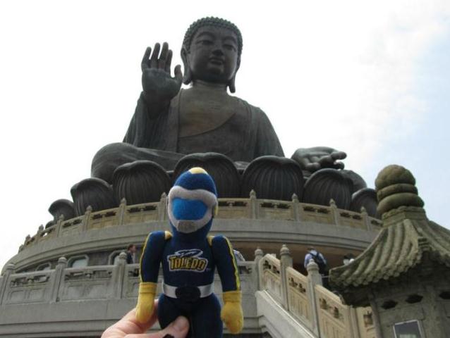 Rocky in front of Budda statue