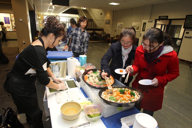 students enjoying sushi