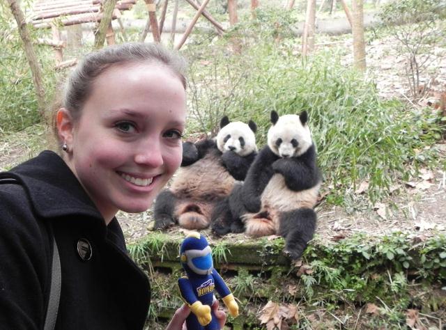 UT Rocket student visiting pandas