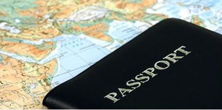Picture of a passport with a map of the world