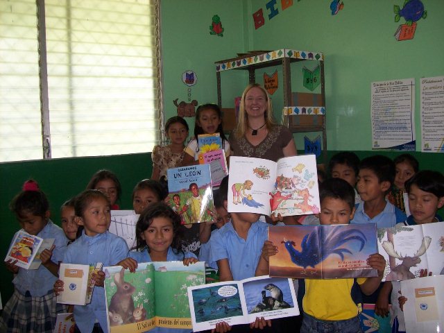 Laura with children and their books