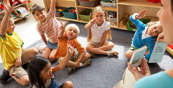 children sitting in a circle at a daycare
