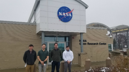 team members in front of NASA Glenn Research Center