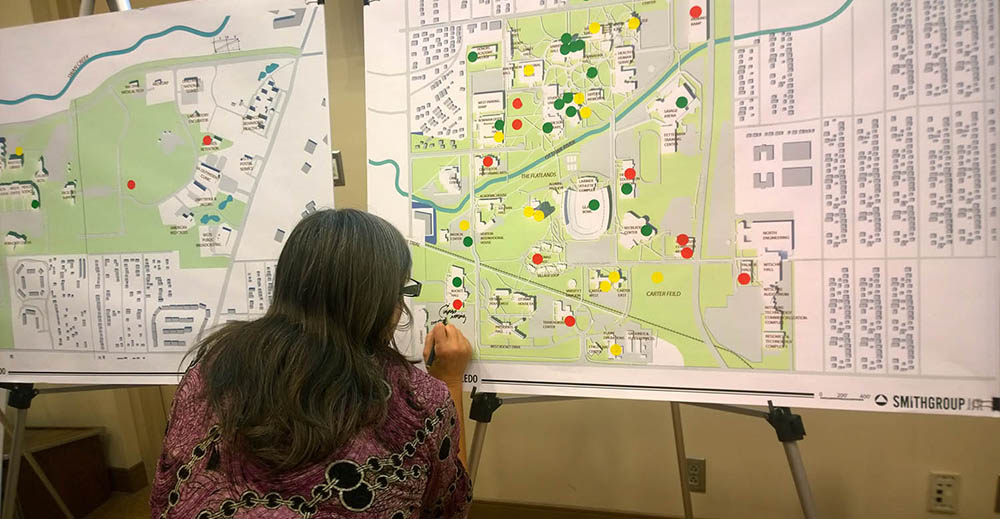 Women reviewing campus maps