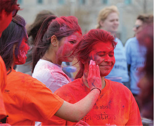 Students throwing colors during Indian student festival