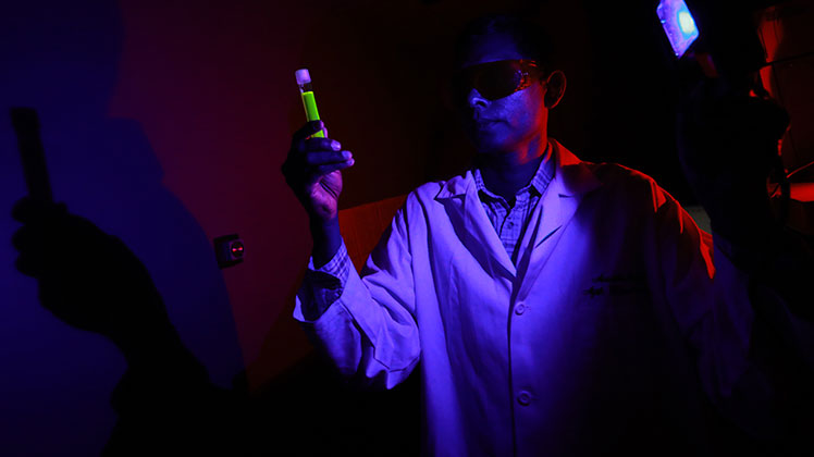 Dr. Ajith Karunarathne conducting research.