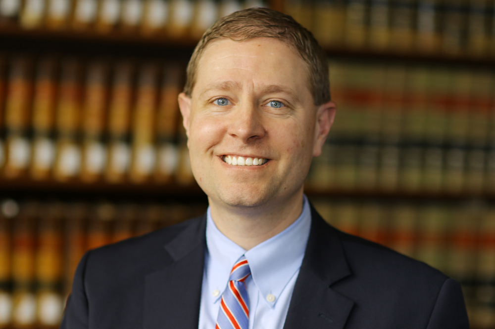 Lee J. Strang