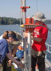 Geology students collect sediment cores
