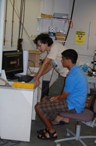 Two outreach students working on macromolecular structure solution.