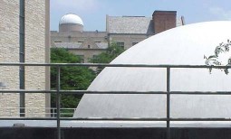 View of McMaster Hall and Brooks Observatory with the dome of Ritter Planetarium in the foreground