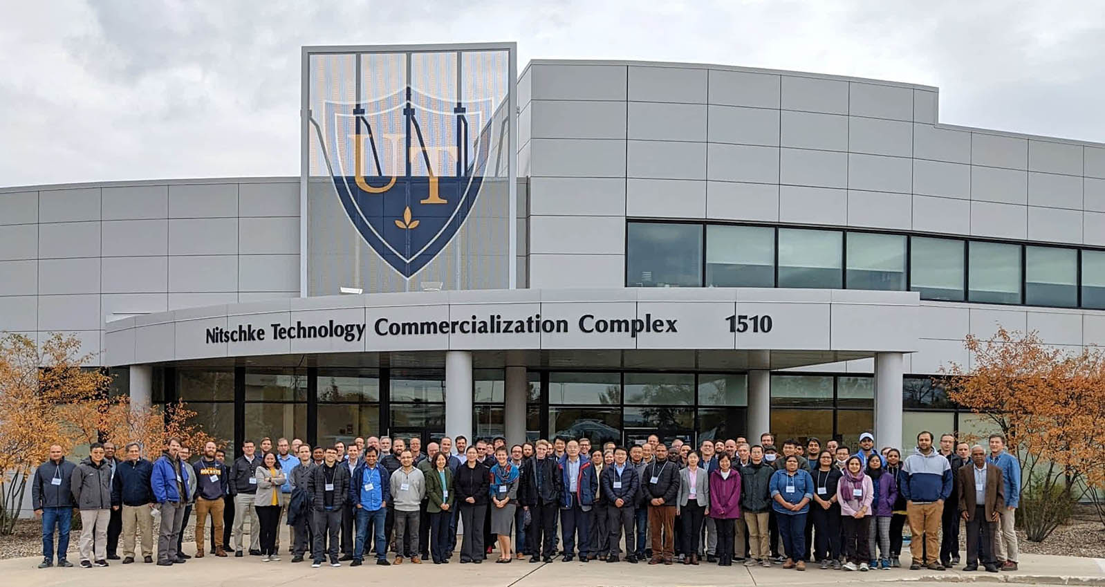 PVIC research group photo in front of Nitschke Technology Commercialization Copmlex