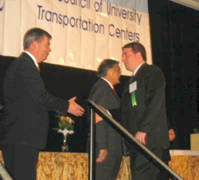 Guy Schafer, 2006 Student of the Year, being congratulated at the CUTC banquet in Washington, DC