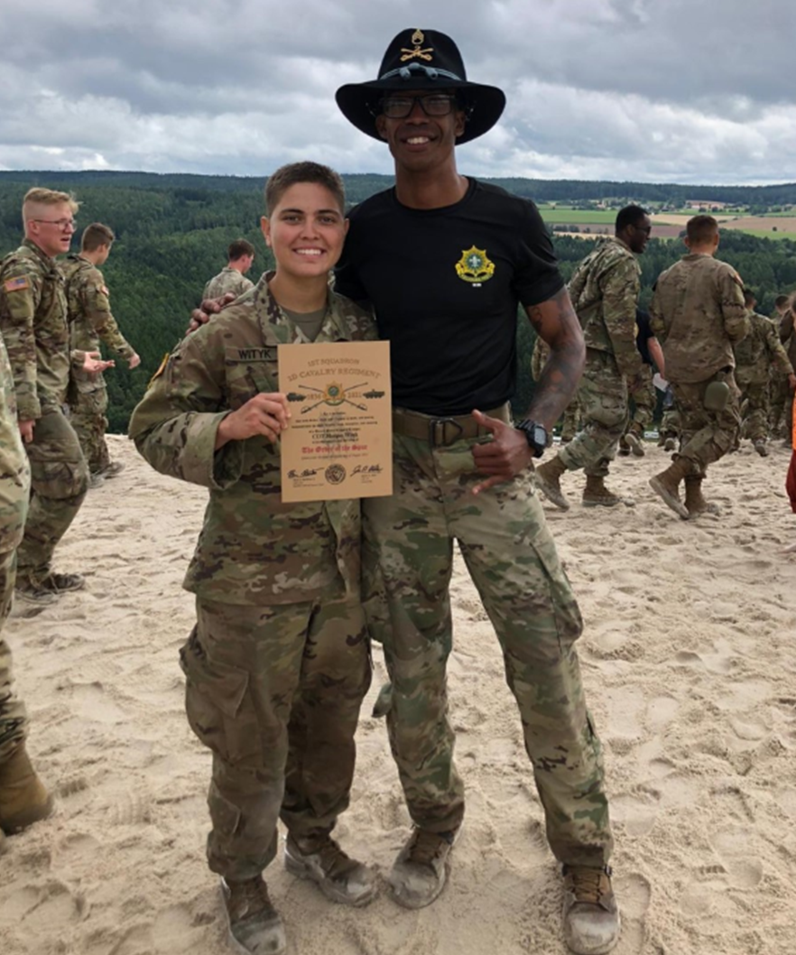 CDT Morgan Wityk holding a certificate of completion