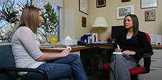 two woman talking at the counseling center