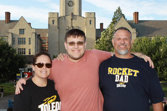 A University of Toledo student with his family