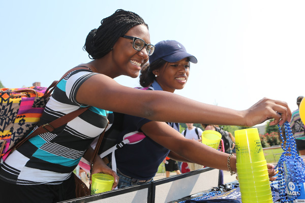 Two students participating in the Student Organization Fair