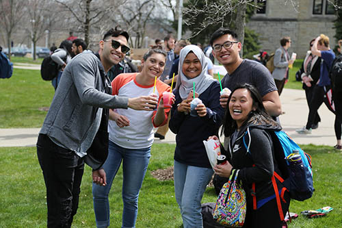 students enjoying beverages on campus