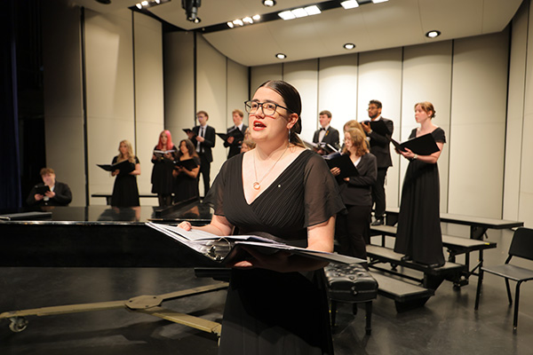 Choir and student singing