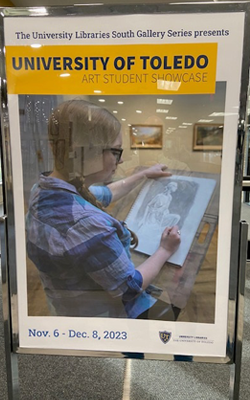 Carlson LIbrary Art Showcase sign with text and young woman with a sketchpad