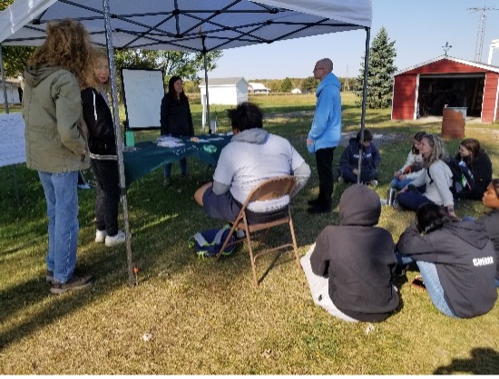 Students at Earth Heart Farms learning about STEM careers