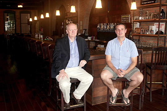 Dr. Neil Reid and Andy Moore, Mike Moore’s brother, got together recently at the Black Cloister Brewing Co. in Toledo.