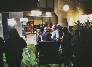 Faculty and students on a night shoot with guest filmmaker Simon Huber