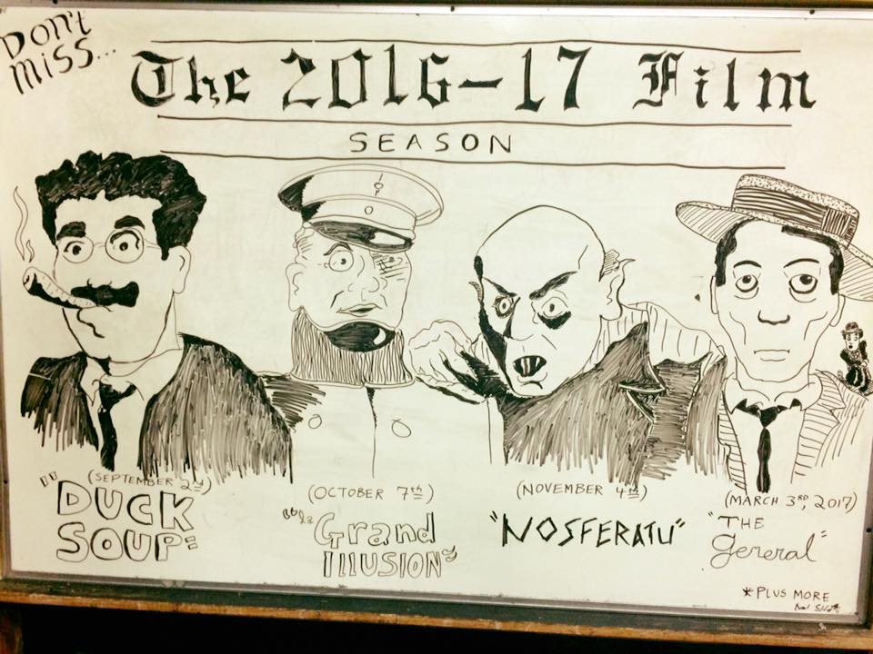 The art shown was drawn on a white board by talented student Evan Sennett, previewing our next season!