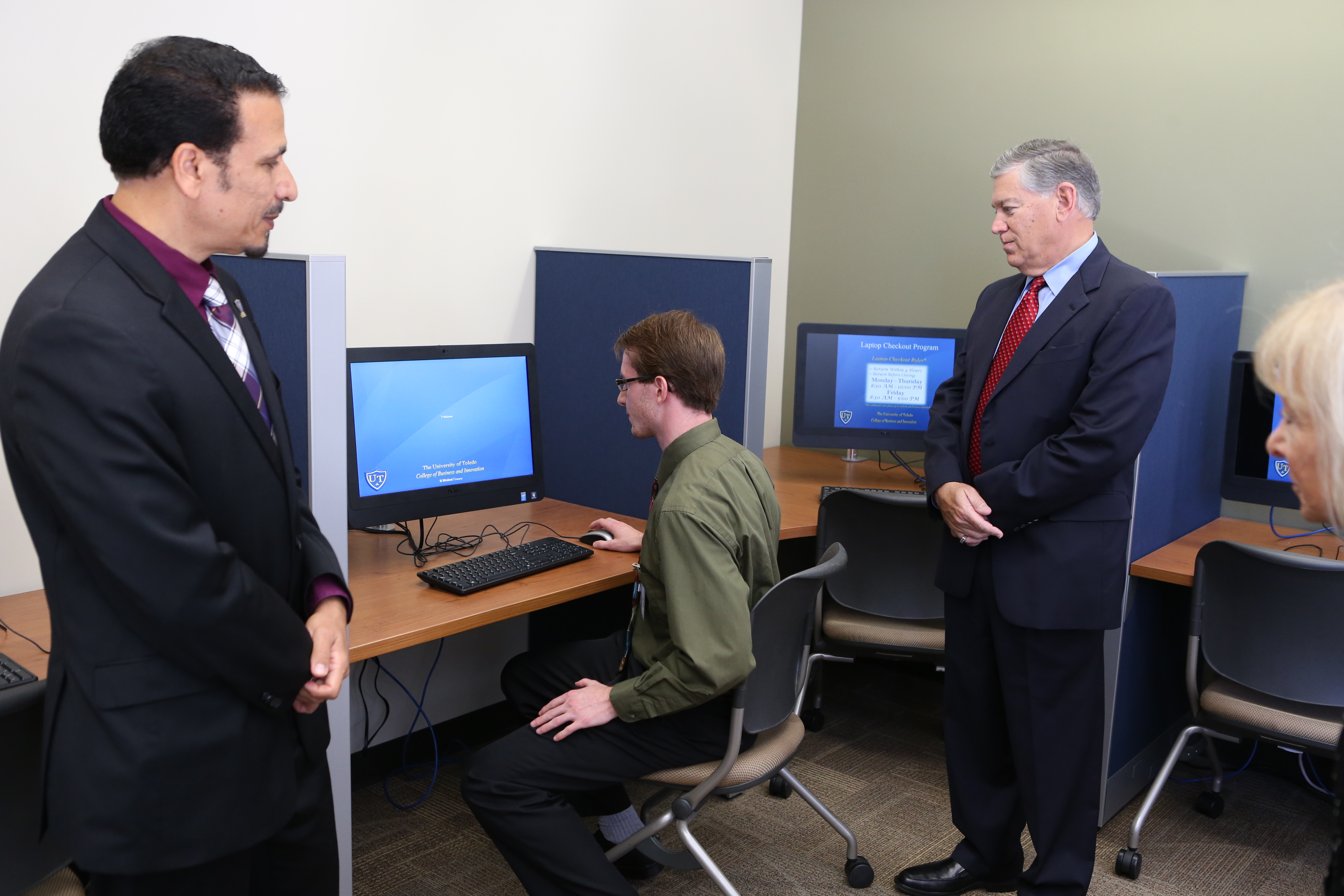 Accounting chair Dr. HassabElnaby, student, Alan Barry