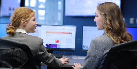 Students pose in the Neff Trading Room.