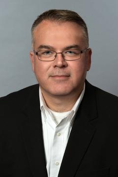Jason Pant headshot