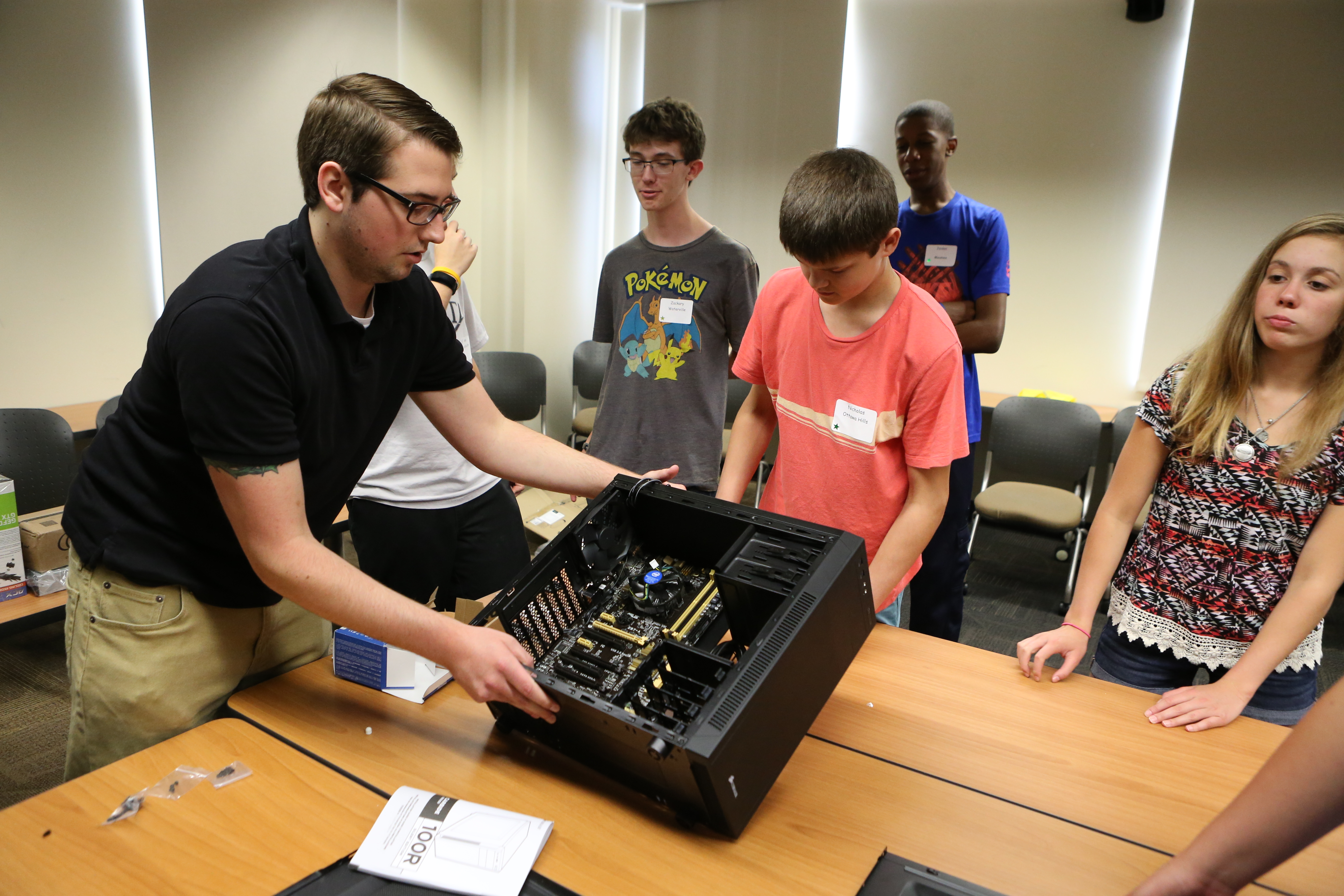 COBI Computing employee Nick Jackson instructs campers