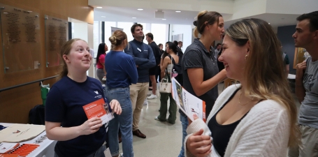 A business speaks with a local employer at the Chillin' With the Firms Ice Cream Social on September 11, 2024.