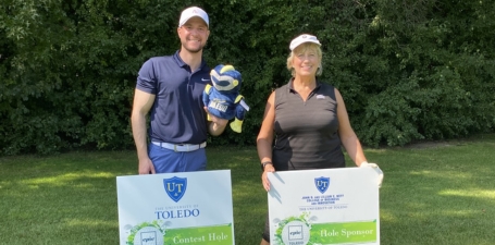 The Neff College's Dean Anne L. Balazs (right) and John Anderson III, MBA, marketing specialist, participated in the EPIC Toledo Golf Outing on Friday, Sept. 22 at Belmont Country Club. The College was also a proud sponsor of the event.