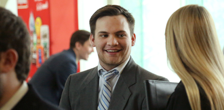 Young man wearing a business suit and tie