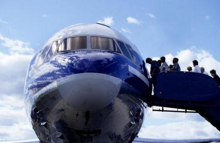 people boarding an airplane