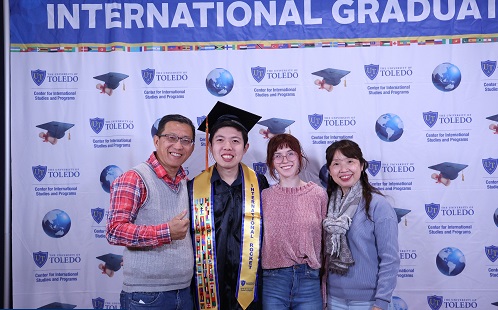 international graduate and family