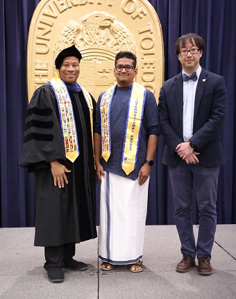 international student with stole