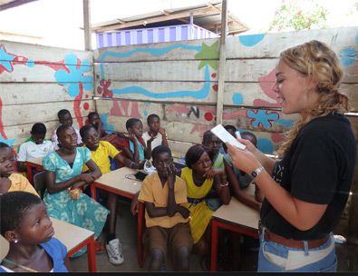 person teaching in a classroom abroad