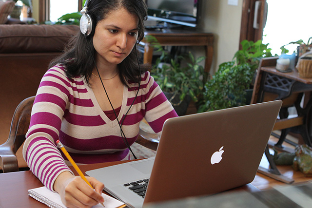 A student working on a laptop