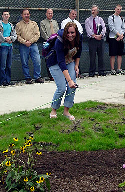 Kristin Cavanagh cutting the ribbon