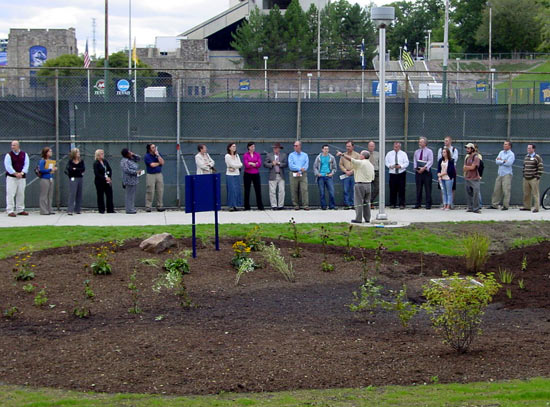 Dr Patrick Lawrence makes the rain garden dedication speech