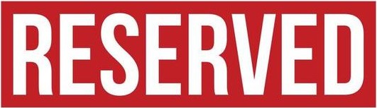 Color image of a red reserved sign with white letters